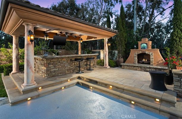 Exterior, Fireplace, Pool