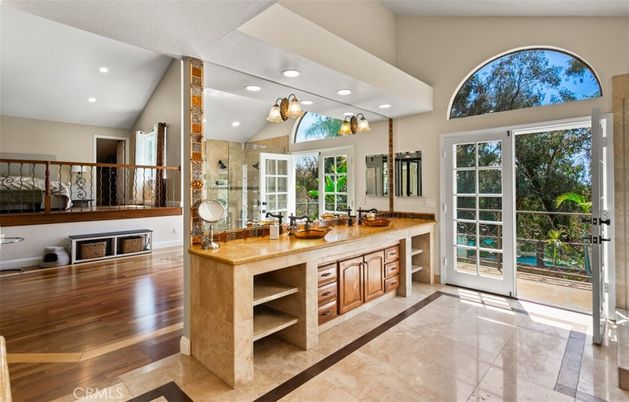Bathroom, Dual Sink Vanities, Glass Shower, Interior, Recessed Lighting, Wood Texture Flooring