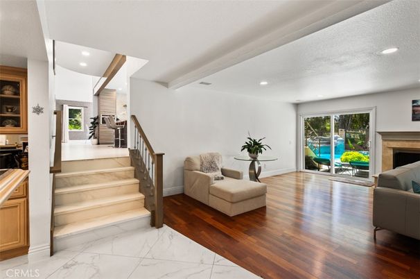 Fireplace, Interior, Marble, Recessed Lighting, Wood Texture Flooring