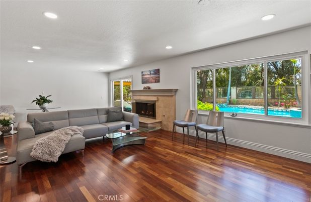 Fireplace, Interior, Living room, Recessed Lighting, Wood Texture Flooring