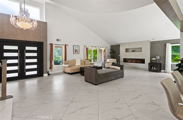Chandelier, Fireplace, Interior, Living room, Marble