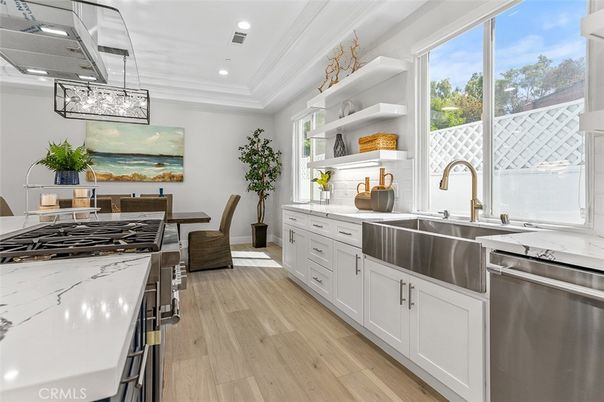 Dining room, Interior, Kitchen, Pendant Lights, Recessed Lighting, Stainless Steel Appliances, Wood Texture Flooring