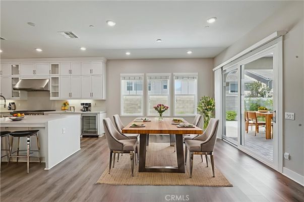 Dining room, Interior, Kitchen, Recessed Lighting, Stainless Steel Appliances, Wood Texture Flooring