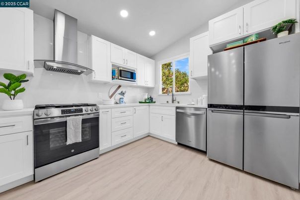Interior, Kitchen, Recessed Lighting, Stainless Steel Appliances, Wood Texture Flooring