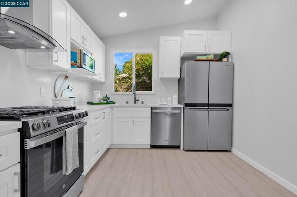 Interior, Kitchen, Recessed Lighting, Stainless Steel Appliances, Wood Texture Flooring