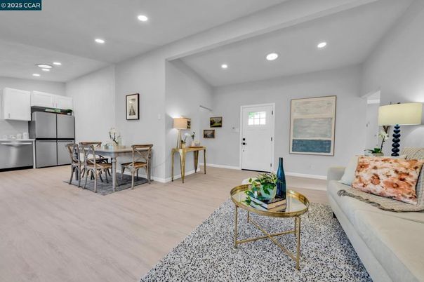 Dining room, Interior, Kitchen, Living room, Recessed Lighting, Stainless Steel Appliances, Wood Texture Flooring