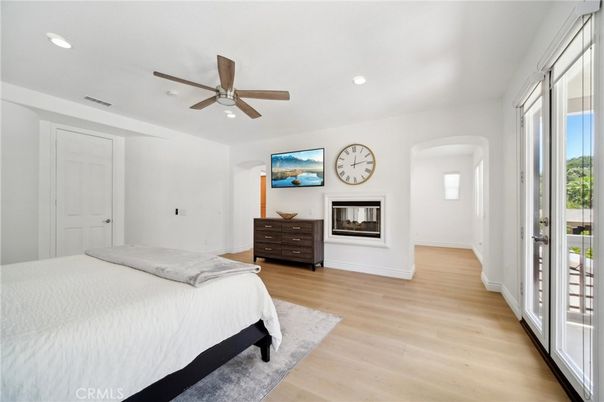 Bedroom, Fireplace, Interior, Recessed Lighting, Wood Texture Flooring