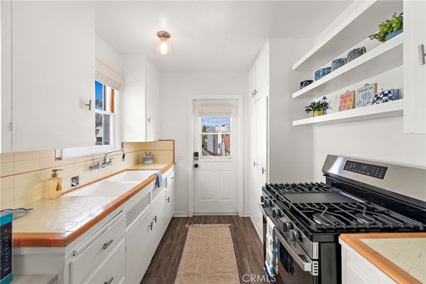Interior, Kitchen, Tile Countertops, Wood Texture Flooring