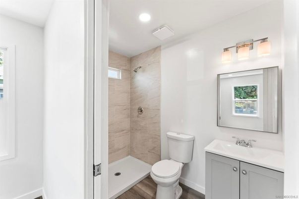 Bathroom, Interior, Marble Walls, Recessed Lighting, Wood Texture Flooring