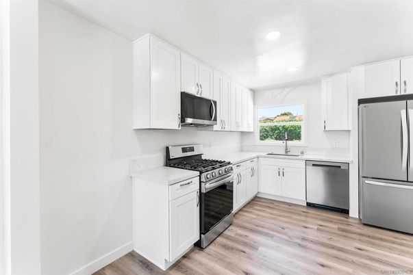 Interior, Kitchen, Recessed Lighting, Stainless Steel Appliances, Wood Texture Flooring