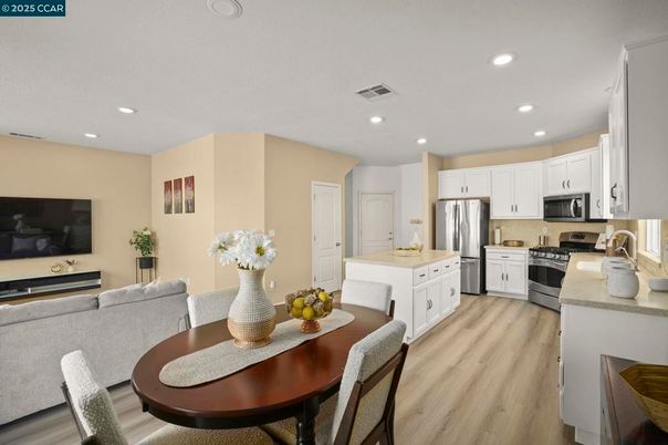 Dining room, Interior, Kitchen, Recessed Lighting, Stainless Steel Appliances, Wood Texture Flooring