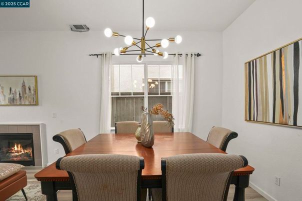 Dining room, Fireplace, Interior, Pendant Lights, Wood Texture Flooring