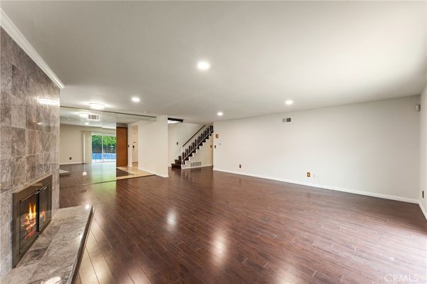 Empty room, Fireplace, Interior, Recessed Lighting, Wood Texture Flooring