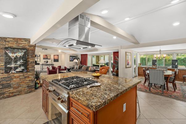 Chandelier, Dining room, Interior, Kitchen, Living room, Recessed Lighting, Stainless Steel Appliances, Stone Walls