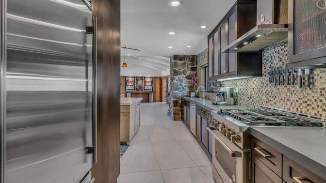 Interior, Kitchen, Recessed Lighting, Stainless Steel Appliances, Stone Walls