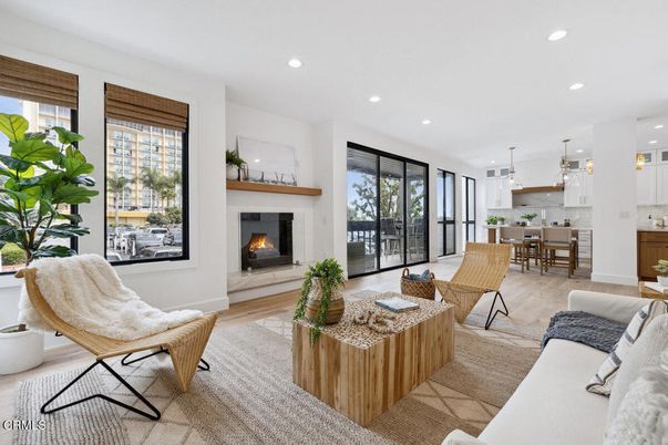 Dining room, Fireplace, Interior, Living room, Pendant Lights, Recessed Lighting, Wood Texture Flooring