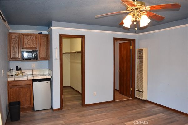 Interior, Kitchen, Tile Countertops, Wood Texture Flooring