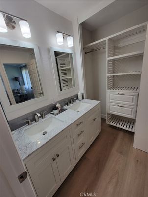 Bathroom, Dual Sink Vanities, Interior, Walk-in Closets, Wood Texture Flooring