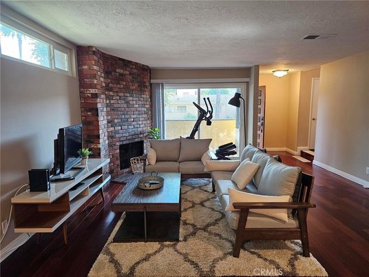 Fireplace, Fitness Equipment, Interior, Living room, Stone Walls, Wood Texture Flooring