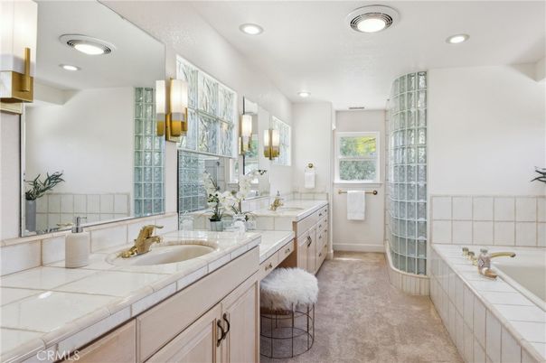 Bathroom, Dual Sink Vanities, Interior, Recessed Lighting, Tile Countertops