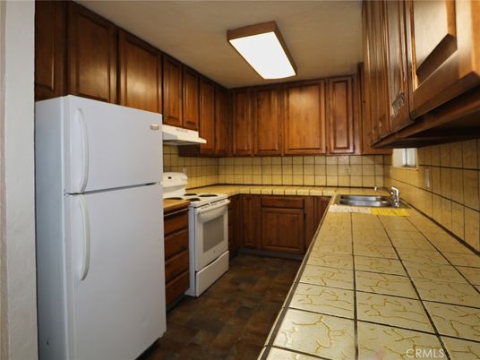 Interior, Kitchen, Tile Countertops, Wood Texture Flooring