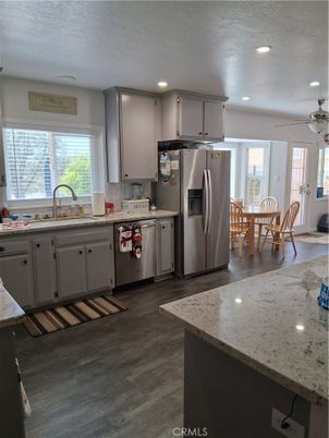 Dining room, Interior, Kitchen, Recessed Lighting, Stainless Steel Appliances, Wood Texture Flooring