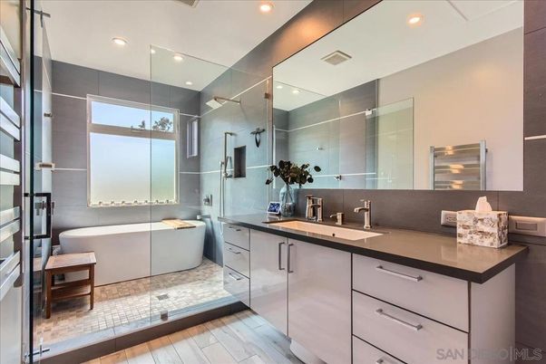Bathroom, Dual Sink Vanities, Free Standing Baths, Glass Shower, Interior, Recessed Lighting, Wood Texture Flooring