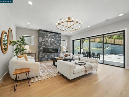 Chandelier, Fireplace, Interior, Living room, Recessed Lighting, Wood Texture Flooring