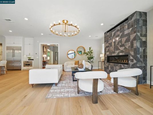 Chandelier, Fireplace, Interior, Living room, Recessed Lighting, Wood Texture Flooring
