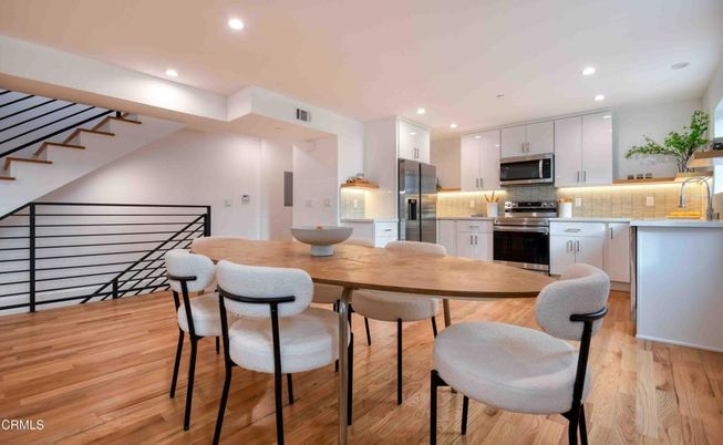 Dining room, Interior, Kitchen, Recessed Lighting, Stainless Steel Appliances, Wood Texture Flooring
