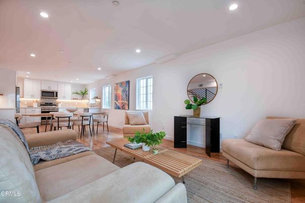 Dining room, Interior, Kitchen, Living room, Recessed Lighting, Stainless Steel Appliances, Wood Texture Flooring