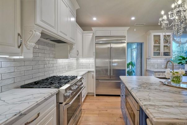Chandelier, Interior, Kitchen, Recessed Lighting, Stainless Steel Appliances, Wood Texture Flooring