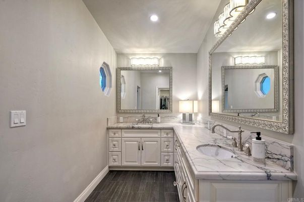 Bathroom, Dual Sink Vanities, Interior, Recessed Lighting, Wood Texture Flooring