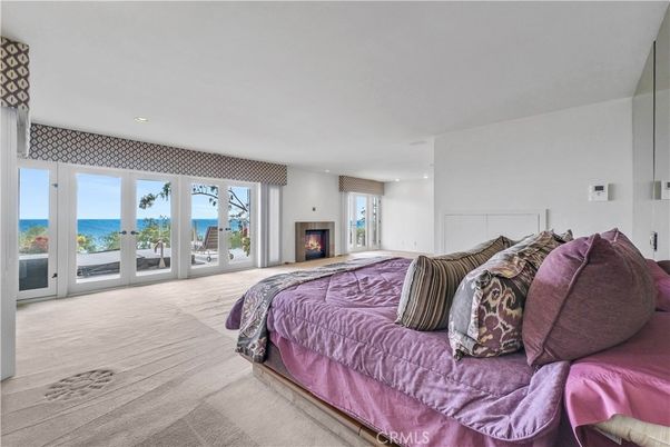 Bedroom, Fireplace, Interior, Recessed Lighting, Water, Wood Texture Flooring