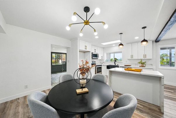 Dining room, Interior, Kitchen, Pendant Lights, Recessed Lighting, Stainless Steel Appliances, Wood Texture Flooring