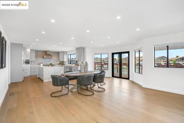 Dining room, Interior, Kitchen, Recessed Lighting, Stainless Steel Appliances, Wood Texture Flooring