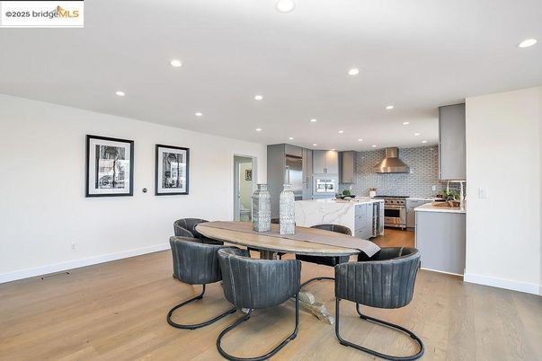 Dining room, Interior, Kitchen, Recessed Lighting, Stainless Steel Appliances, Wood Texture Flooring
