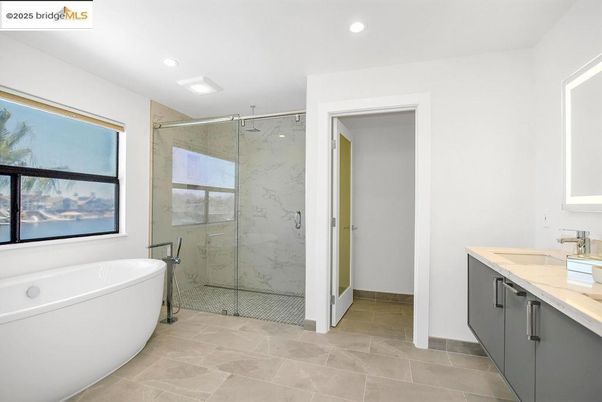 Bathroom, Free Standing Baths, Glass Shower, Interior, Marble Walls, Recessed Lighting