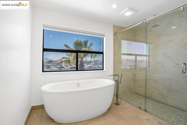 Bathroom, Free Standing Baths, Glass Shower, Interior, Marble Walls, Recessed Lighting