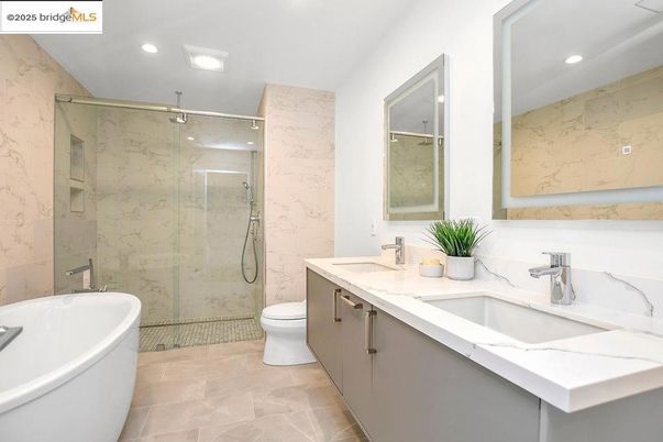Bathroom, Dual Sink Vanities, Free Standing Baths, Glass Shower, Interior, Marble Walls, Recessed Lighting