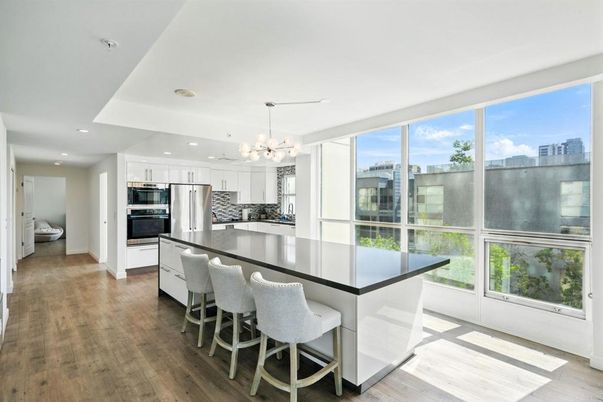 Chandelier, Interior, Kitchen, Pendant Lights, Recessed Lighting, Stainless Steel Appliances, Wood Texture Flooring
