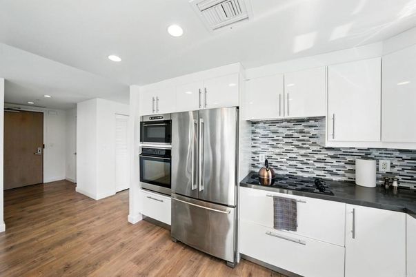 Interior, Kitchen, Recessed Lighting, Stainless Steel Appliances, Wood Texture Flooring