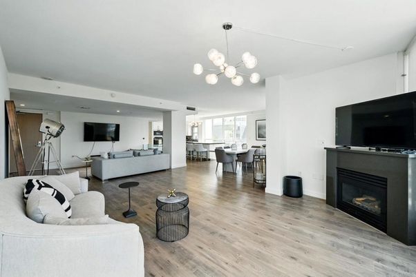 Dining room, Fireplace, Interior, Living room, Pendant Lights, Recessed Lighting, Wood Texture Flooring