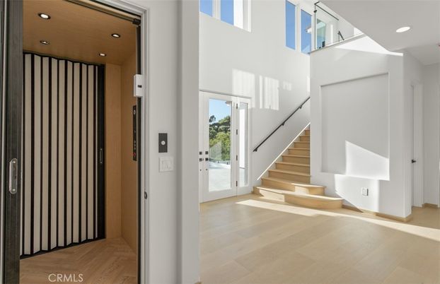 Elevator, Interior, Recessed Lighting, Wood Texture Flooring