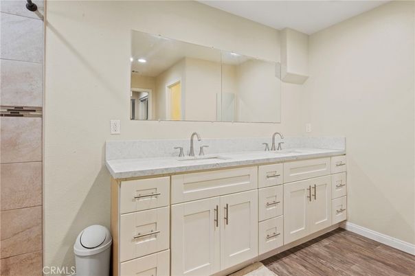 Bathroom, Dual Sink Vanities, Interior, Recessed Lighting, Wood Texture Flooring