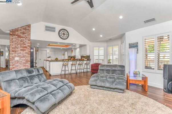 Fireplace, Interior, Kitchen, Living room, Recessed Lighting, Stone Walls, Wood Texture Flooring