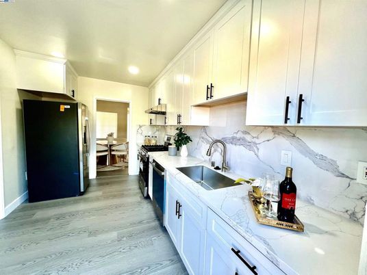 Interior, Kitchen, Marble Walls, Recessed Lighting, Wood Texture Flooring