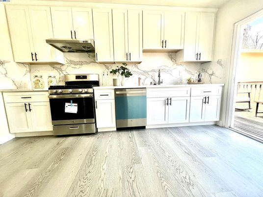 Interior, Kitchen, Marble Walls, Stainless Steel Appliances, Wood Texture Flooring