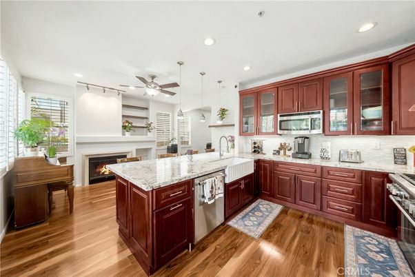 Fireplace, Interior, Kitchen, Pendant Lights, Recessed Lighting, Wood Texture Flooring