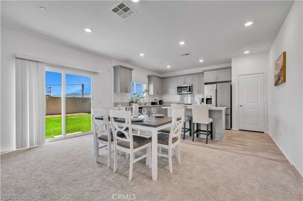 Dining room, Interior, Kitchen, Recessed Lighting, Stainless Steel Appliances, Wood Texture Flooring